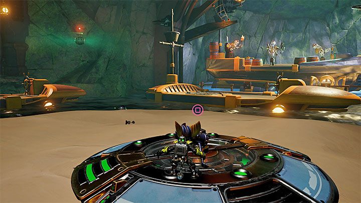 Po wygranej bitwie z bossem zainteresujcie się centralnym mechanizmem z korbą - Ratchet & Clank Rift Apart: Zaliczenie pirackich prób - solucja - Ratchet & Clank Rift Apart - poradnik do gry