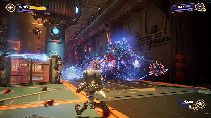 Po wejściu do centrum transferu więźniów (Prisoner Transfer Centre) spodziewajcie się napotkania kolejnych maszyn podległych Nefariousowi - Ratchet & Clank Rift Apart: Odnalezienie Ratcheta i Kit - solucja - Ratchet & Clank Rift Apart - poradnik do gry