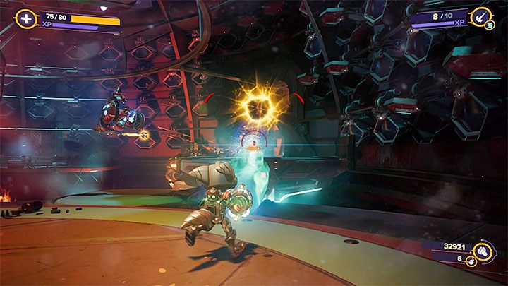 Do kolejnych walk dojdzie w dużej okrągłej sali z wyłączonym reaktorem - Ratchet & Clank Rift Apart: Wyłączenie reaktora - solucja - Ratchet & Clank Rift Apart - poradnik do gry