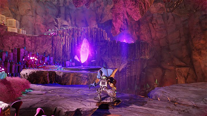 W trakcie przeprawy ponownie pilnujcie się w miejscach, w których w regularnych odstępach czasu wydobywa się lawa - Ratchet & Clank Rift Apart: Odnalezienie szefowej Tulio - solucja - Ratchet & Clank Rift Apart - poradnik do gry