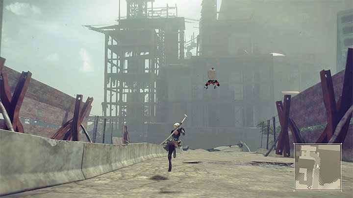 Wyruszcie na wprost po uszkodzonym moście, dzieki czemu dotrzecie w pobliże fabryki - NieR Automata: Fabryka z prologu - jak powrócić? - NieR Automata - poradnik do gry
