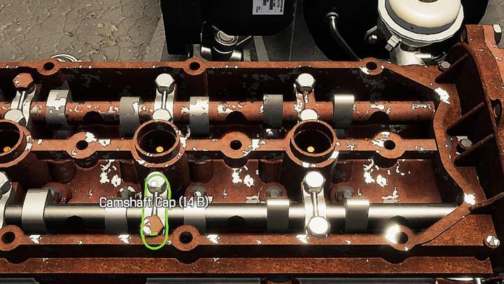 Z drugiej strony, od góry po zdjęciu pokrywy głowicy silnika (engine head cover) są natomiast nieco podobne pokrywy wałka rozrządu (camshaft cap) - Niewykryta część - co robić, jak znaleźć? - Car Mechanic Simulator 2021 - poradnik do gry