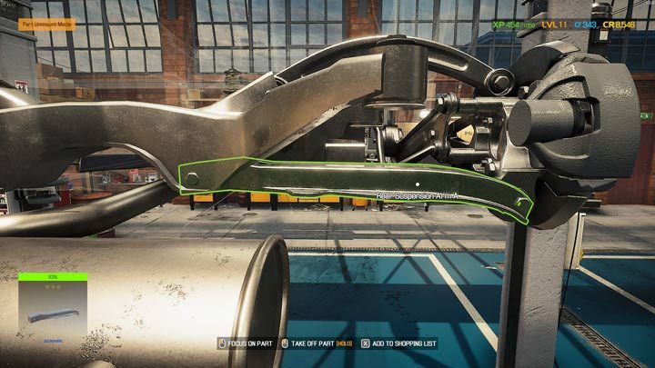 Aby dostać się do kolejnej należy zdemontować ramię wahacza tylnego (rear suspension arm) u dołu - Tuleja gumowa - gdzie znaleźć? - Car Mechanic Simulator 2021 - poradnik do gry