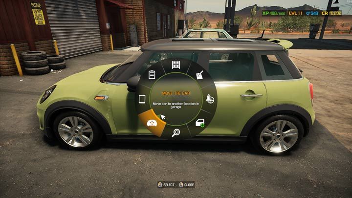 Włączcie menu kołowe na samochodzie czekającym na naprawę i wybierzcie funkcję Przestaw - Car Mechanic Simulator 2021: Wymiana części - Car Mechanic Simulator 2021 - poradnik do gry