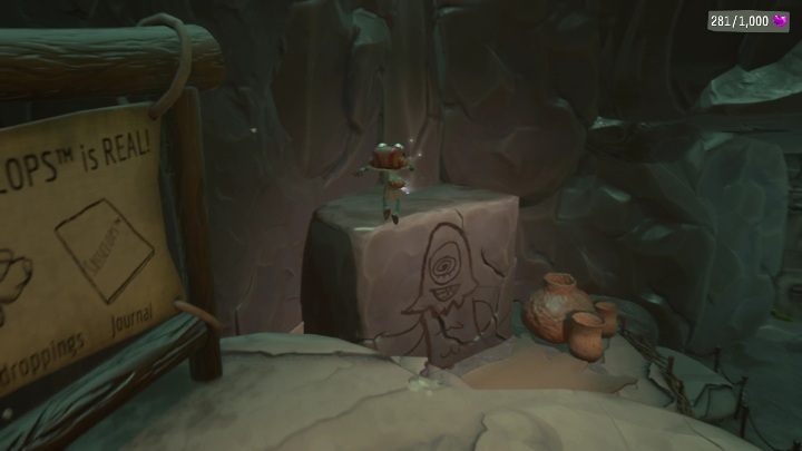 Karta czeka na Was w jaskini, zaraz obok skały, na której widnieje malunek - Psychonauts 2: PSI Challenge Card, Questionable Area - gdzie znaleźć? - Psychonauts 2 - poradnik do gry
