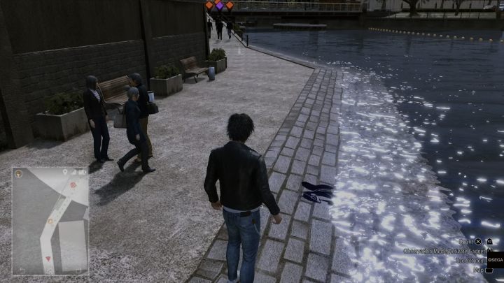 3 obrazek z wiewiórką znajduje się na skraju ścieżki przy rzece, w dzielnicy North Jinnai Station - Lost Judgment: Squirrel search Jinnai Station - wszystkie wiewiórki, mapa - Lost Judgment - poradnik do gry