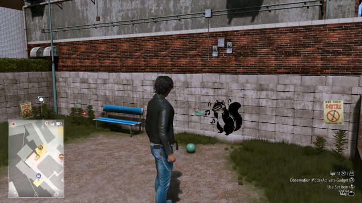 16 obrazek zlokalizowany jest na ścianie, niedaleko baru Survive - Lost Judgment: Squirrel search Bar District - wszystkie wiewiórki, mapa - Lost Judgment - poradnik do gry