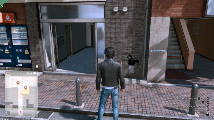 23 obrazek zlokalizowany jest na ścianie, tuż przy wejściu do biura Yokohama 99 - Lost Judgment: Squirrel search Isezaki Road - wszystkie wiewiórki, mapa - Lost Judgment - poradnik do gry