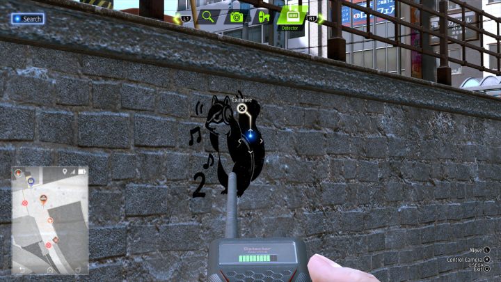 Użyjcie detektora, aby znaleźć następny obrazek wiewiórki na murze przy rzece - Lost Judgment: Squirrel search Commercial District - wszystkie wiewiórki, mapa - Lost Judgment - poradnik do gry