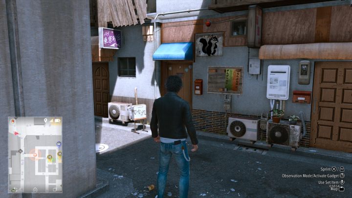 40 obrazek znajduje się przy zachodnim wejściu do Champion District - Lost Judgment: Squirrel search E Shichifuku - wszystkie wiewiórki, mapa - Lost Judgment - poradnik do gry