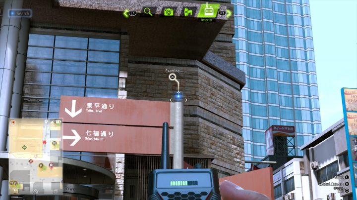 Przy użyciu detektora zbadajcie pobliski słup, aby znaleźć Anime Paint - Lost Judgment: Squirrel search Theater - wszystkie wiewiórki, mapa - Lost Judgment - poradnik do gry