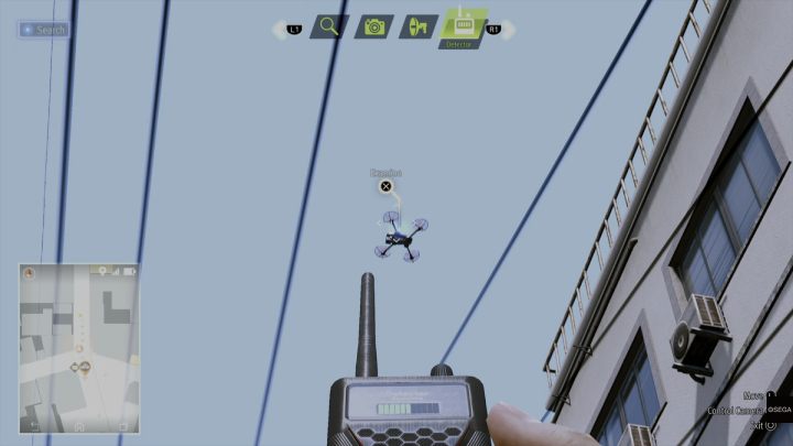 Przy użyciu detektora zbadajcie drona, latającego przy skrzyżowaniu ulic E Central i W Central - Lost Judgment: Dastardly Detective, Before the Torch Burns Out - solucja - Lost Judgment - poradnik do gry