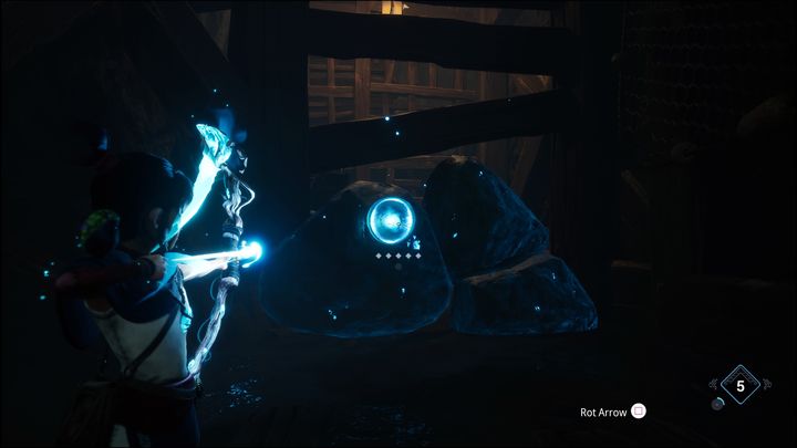 Po prawej stronie znajdują się kamienie, rzućcie bombą i wejdźcie do środka, znajdziecie tam skrzynię z kryształami - Kena Bridge of Spirits: Help the Woodsmith - solucja, opis przejścia - Kena Bridge of Spirits - poradnik do gry