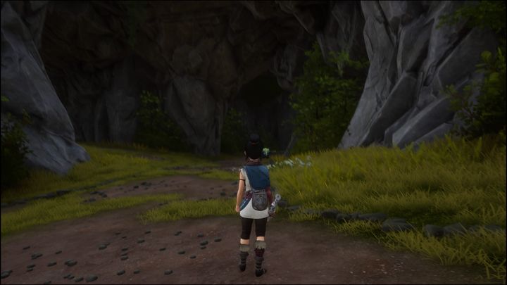 Idąc właśnie w tamtą stronę, zobaczycie dużą jaskinię, do której będziecie musieli zejść, aby wykonać dalszy cel misji - Kena Bridge of Spirits: Adiras Regret - solucja, opis przejścia - Kena Bridge of Spirits - poradnik do gry