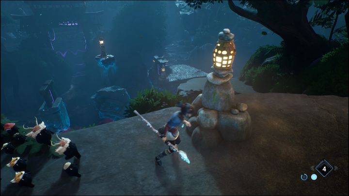 Po przejściu na drugą stronę za pomocą Dasha, należy rzucić bombą w połyskujące się w oddali kamienie, a następnie zjechać na dół - Kena Bridge of Spirits: Warrior Path - solucja, opis przejścia - Kena Bridge of Spirits - poradnik do gry