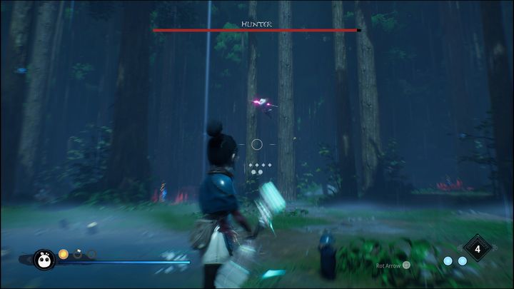 Trafienie Hunter nie jest łatwe, gdyż w momencie, gdy nie atakuje, zacznie wykonywać uniki w bok, gdy tylko najedziecie celownikiem na bossa - Kena Bridge of Spirits: Hunter - boss, jak pokonać? - Kena Bridge of Spirits - poradnik do gry