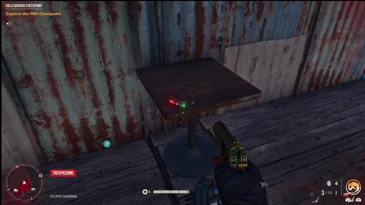 Ten pendrive leży na niewielkim drewnianym stoliku, na terenie restauracji - Far Cry 6: Piosenki z Pendriveów - lista wszystkich, lokalizacja - Far Cry 6 - poradnik do gry