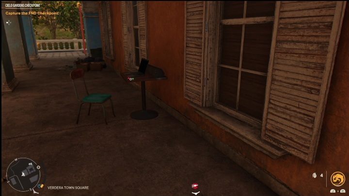 Ten pendrive znajduje się na niewielkim drewnianym stoliku, zaraz obok laptopa - Far Cry 6: Piosenki z Pendriveów - lista wszystkich, lokalizacja - Far Cry 6 - poradnik do gry