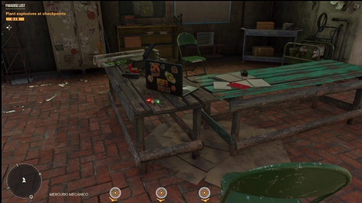 Pendrive leży na drewnianym stole, zaraz za laptopem ozdobionym wieloma naklejkami - Far Cry 6: Piosenki z Pendriveów - lista wszystkich, lokalizacja - Far Cry 6 - poradnik do gry