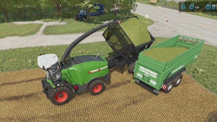 Silosokombajny nie posiadają bowiem własnego zbiornika - należy podpiąć do nich przyczepę, która może przechować sieczkę - Farming Simulator 22: Sieczka - pozyskiwanie i sprzedaż - Farming Simulator 22 - poradnik do gry