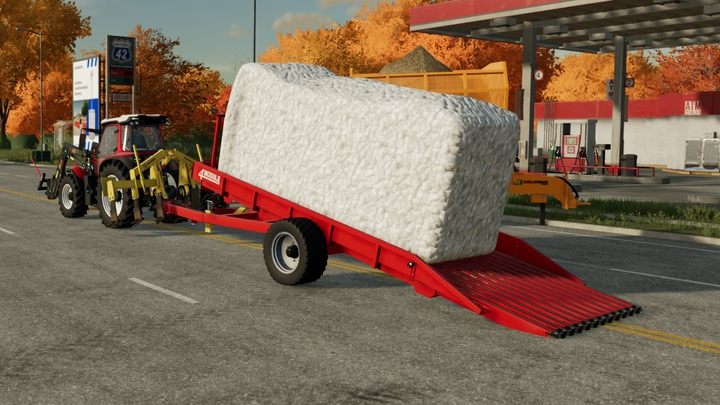Nawet najtańsza przyczepa do bawełny posiada opcję automatycznego załadunku bel. - Farming Simulator 22: Bawełna - Farming Simulator 22 - poradnik do gry