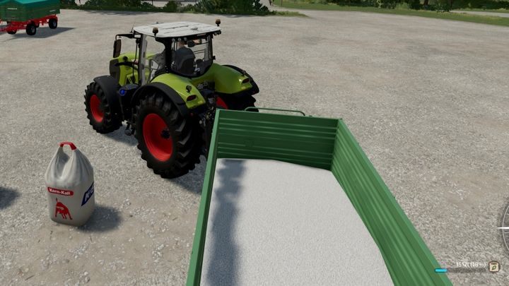 Aby mieć dostęp do wybranych materiałów w pobliżu Waszych pól, możecie worki czy palety przetransportować w dowolne miejsce i tam pozostawić - Farming Simulator 22: Napełnianie zbiorników maszyn - Farming Simulator 22 - poradnik do gry