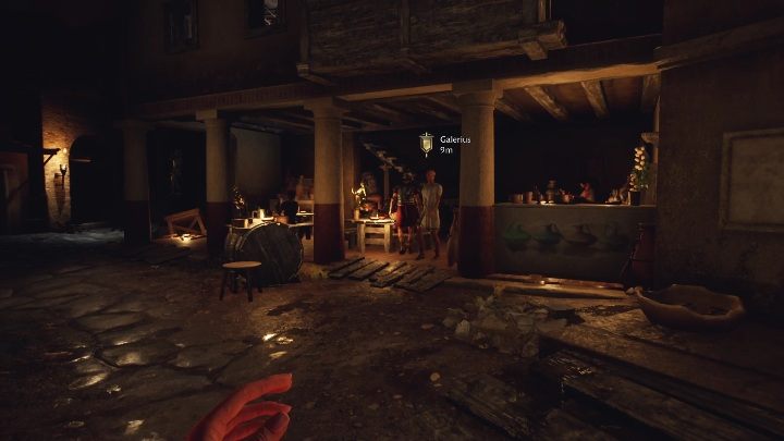 Galerius siedzi w barze wraz z innymi mieszkańcami - The Forgotten City: Galerius i Equitia - jak zacząć romans? - The Forgotten City - poradnik do gry