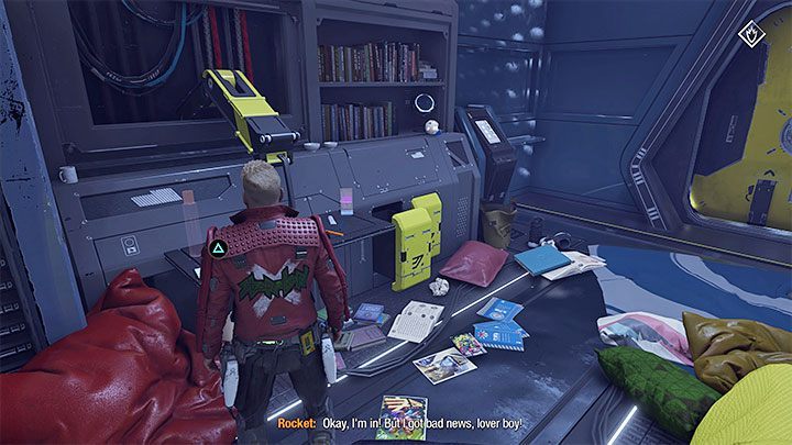 W głównym pomieszczeniu obok biurka jest Znajdźka Strażnika: Odznaczenie z Wojny Galaktycznej (Galactic War Commendation) - Guardians of the Galaxy: Rozdział 7 - solucja, opis przejścia - Guardians of the Galaxy - poradnik do gry
