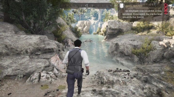 Ostatecznie dotrzecie do wąskiej rzeki, otoczonej skałami - Sherlock Holmes Chapter One: Pozłacana klatka, ucieczka słonia - solucja - Sherlock Holmes Chapter One - poradnik do gry