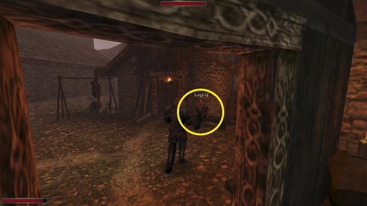 Legrif siedzi przed karczmą - Kroniki Myrtany: Podróż do wnętrza kopalni - solucja, opis przejścia - Kroniki Myrtany - poradnik do gry