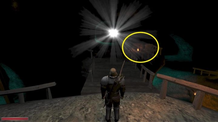 Od głównego wejścia skręćcie w prawo i zejdźcie po ziemnym nasypie - Kroniki Myrtany: Podróż do wnętrza kopalni - solucja, opis przejścia - Kroniki Myrtany - poradnik do gry