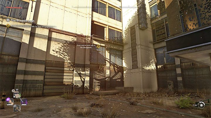 Musicie dotrzeć na górny balkonik budynku - możecie w tym celu wdrapać się po ścianie i złapać się wystających metalowych elementów - Dying Light 2: Przełom - solucja, opis przejścia - Dying Light 2 - poradnik do gry