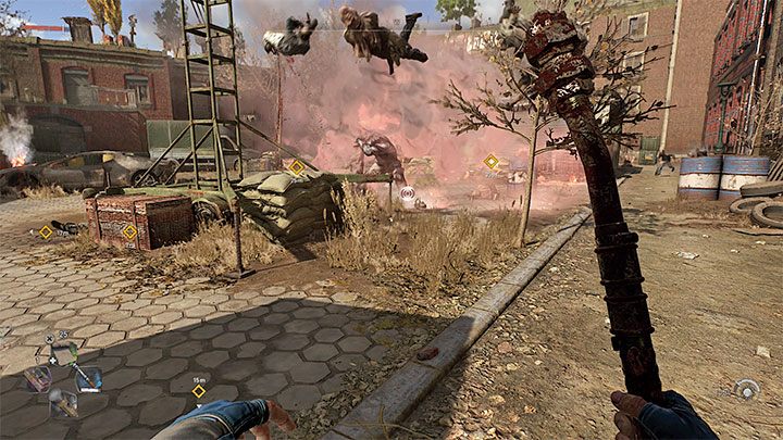 Na dziedzińcu spotkacie kilka goliatów w towarzystwie zwykłych zainfekowanych - Dying Light 2: Rewolucja - solucja, opis przejścia - Dying Light 2 - poradnik do gry