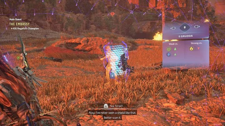 Zauważcie, że elitarny przeciwnik korzysta z tarczy energetycznej i zeskanowanie go pozwoli Wam ustalić, że jego słabościami są ataki wykorzystujące kwas i porażenie - Horizon Forbidden West: Grudda - boss, jak pokonać czempiona Regalli? - Horizon Forbidden West - poradnik do gry