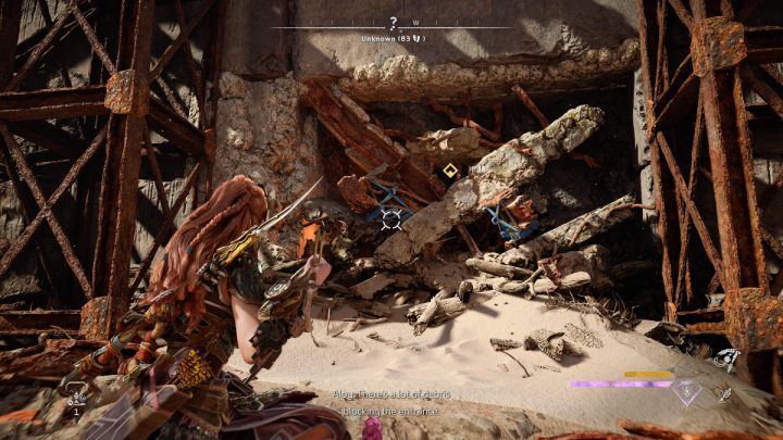 Idźcie do wyznaczonego miejsca na zachodniej stronie zatopionej wioski i przyciągnijcie niebieskie elementy, aby usunąć rumowisko zasłaniające wejście do jaskini - Horizon Forbidden West: Potop (The Deluge) - solucja, opis przejścia - Horizon Forbidden West - poradnik do gry