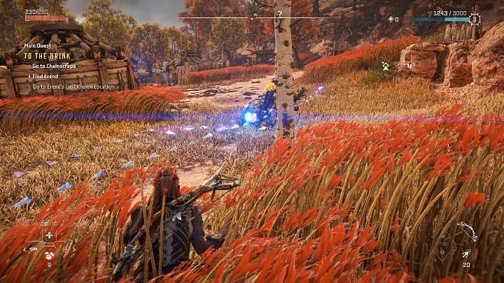 Aloy może łatwo zamaskować swoją obecność, chowając się w wysokiej czerwonej trawie - wtedy staje się nie do wykrycia zarówno dla mechanicznych, jak i ludzkich przeciwników - Horizon Forbidden West: Walka i skradanie się - Horizon Forbidden West - poradnik do gry