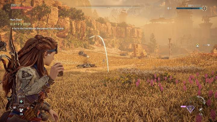 Wciśnijcie kierunek w dół na krzyżaku, a na ekranie pojawi się znacznik trajektorii lotu kamienia - Horizon Forbidden West: Jak rzucać kamieniami? - Horizon Forbidden West - poradnik do gry
