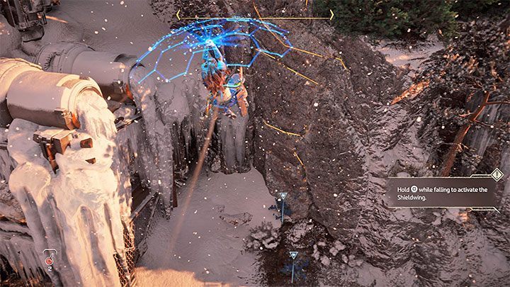 W jednym z obszarów musicie pomóc sobie tarczoskrzydłem żeby poszybować na niższą półkę - Horizon Forbidden West: Oko Ziemi (The Eye of the Earth) - solucja, opis przejścia - Horizon Forbidden West - poradnik do gry