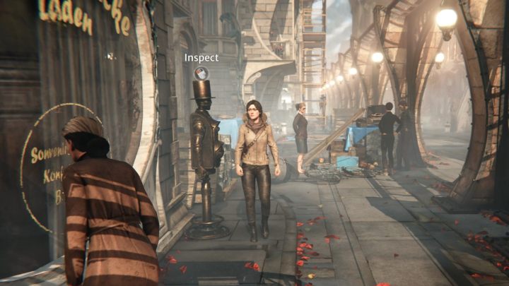 Zbadajcie automat po lewej stronie ulicy - Syberia The World Before: Vaghen - most Mgieł, jesień 2005 część 1 (Vaghen - bridge of Mists, autumn 2005 part 1) - solucja, opis przejścia - Syberia The World Before - poradnik do gry