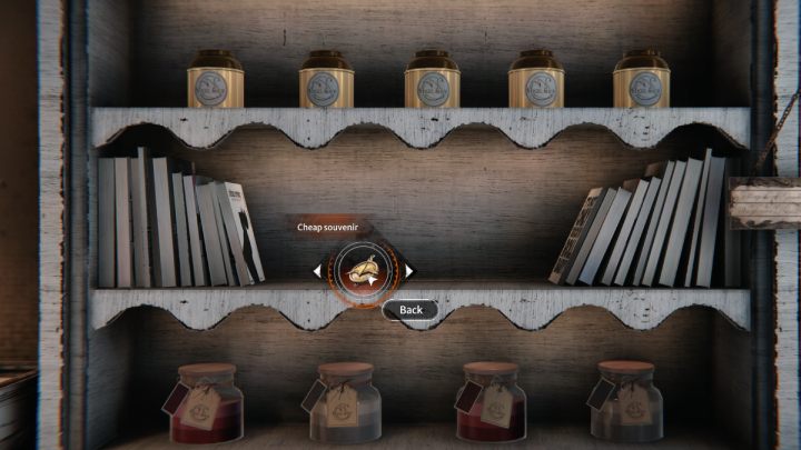 Zbadajcie półkę przy ladzie po prawej stronie i połóżcie na niej tanią pamiątkę, którą wyciągnęliście z automatu na ulicy - Syberia The World Before: Vaghen - most Mgieł, jesień 2005 część 1 (Vaghen - bridge of Mists, autumn 2005 part 1) - solucja, opis przejścia - Syberia The World Before - poradnik do gry