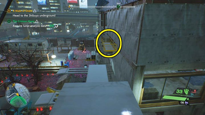 Po udanym lądowaniu przed sobą powinniście widzieć pierwszą windę (powyższy obrazek) - Ghostwire Tokyo: Karmazynowy księżyc (The Crimson Moon) - solucja, opis przejścia - Ghostwire Tokyo - poradnik do gry