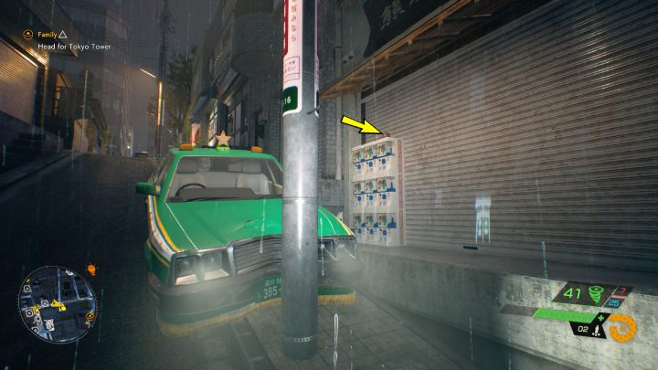 Relikt leży na automatach z zabawkami przy zielonym samochodzie, na wschód od świątyni Utagawa - Ghostwire Tokyo: Relikty, centralne Tokio (Relics, Central Tokio) - lista wszystkich - Ghostwire Tokyo - poradnik do gry