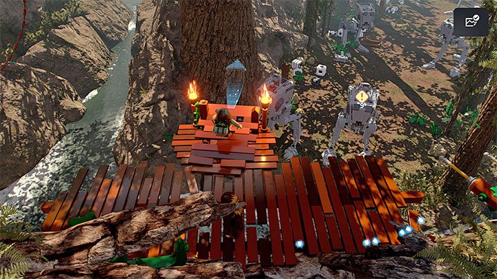 W nowej lokacji ponownie skorzystajcie z wyrzutni sieci, a następnie złapcie się wystającej krawędzi - LEGO Skywalker Saga: Obrona Chewbacki (The Chewbacca Defence) - solucja, opis przejścia - LEGO Skywalker Saga - poradnik do gry