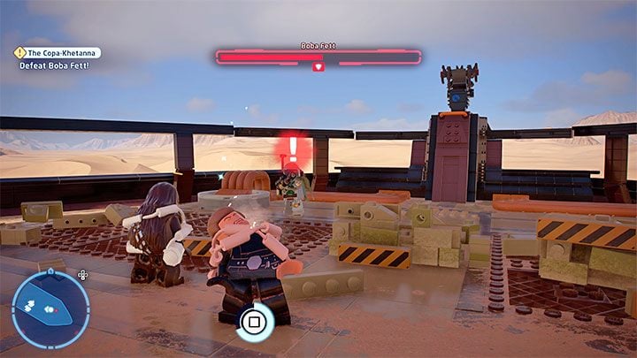 Boss oprócz używania blastera jest w stanie korzystać z ataków mogących zatrzymać bohatera w miejscu - wciskajcie wtedy szybko widoczny na ekranie przycisk żeby się oswobodzić - LEGO Skywalker Saga: Boba Fett - boss, jak pokonać? - LEGO Skywalker Saga - poradnik do gry
