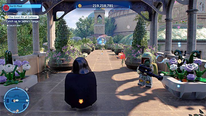 Wewnątrz budynku zajmijcie się zniszczeniem 2 dużych obrazów na ścianach skrywających dźwignie (obrazek 1) oraz przesunięciem 2 dużych skrzyń w pobliże ich - LEGO Skywalker Saga: Theed - lista wszystkich łamigłówek (cz. 2) - LEGO Skywalker Saga - poradnik do gry