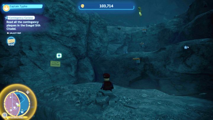 Tabliczka wisi na skale w sali tronowej - LEGO Skywalker Saga: Koneser kryzysów (Contingency Curioso) - solucja, opis przejścia - LEGO Skywalker Saga - poradnik do gry