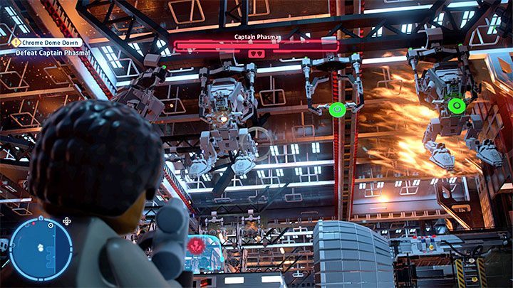 Znajdźcie po prawej stronie źródło energii (obrazek 1) i umieśćcie je w slocie pobliskiego urządzenia - LEGO Skywalker Saga: Kapitan Phasma (Captain Phasma), epizod 8 - boss, jak pokonać? - LEGO Skywalker Saga - poradnik do gry