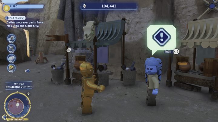 Wybierzcie się do Mos Espa na planecie Tatooine i udajcie się za wyznacznikiem do sprzedawcy przy straganie - LEGO Skywalker Saga: Ściganie ścigaczy (Pod Chasing) - solucja, opis przejścia - LEGO Skywalker Saga - poradnik do gry