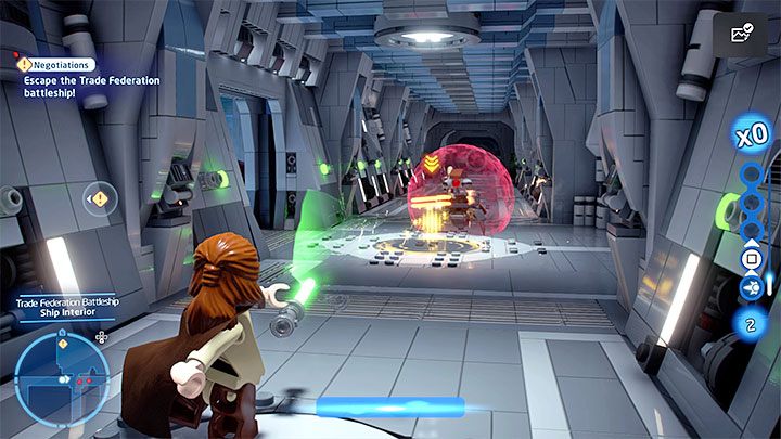 Oprócz zwykłych droidów spotkacie również droidy otoczone polem siłowym - LEGO Skywalker Saga: Ktoś silniejszy (A Bigger Fish) - solucja, opis przejścia - LEGO Skywalker Saga - poradnik do gry