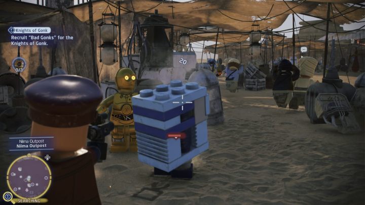 Polećcie do Osady Niima na Jakku i zestrzelcie droida, który będzie atakował ludzi podczas festiwalu - LEGO Skywalker Saga: Rycerze Gonk (Knights of Gonk) - solucja, opis przejścia - LEGO Skywalker Saga - poradnik do gry